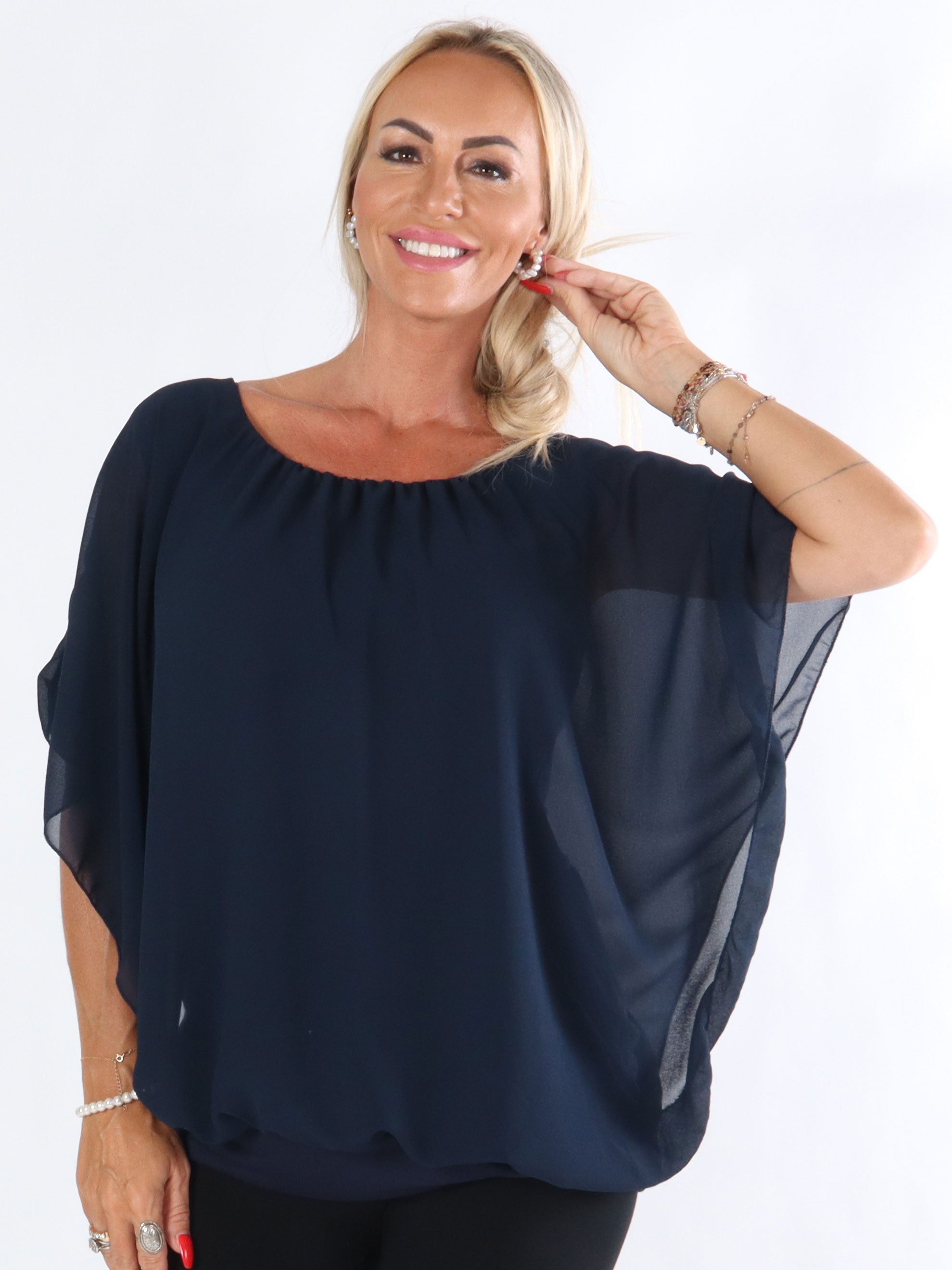 Cala - Elastisk topp med löst chiffongmaterial över